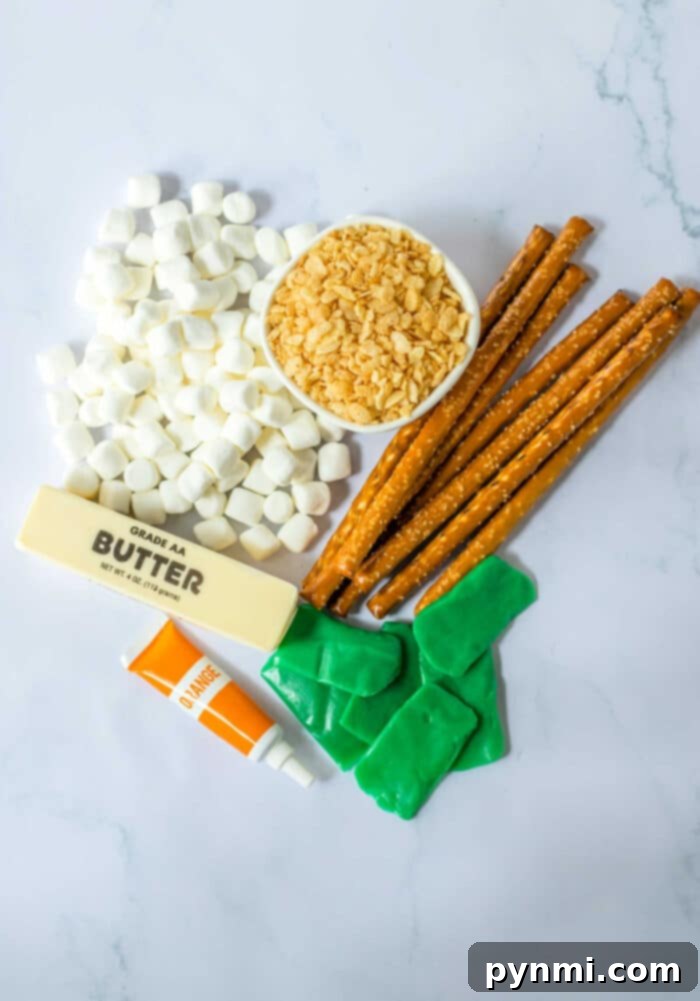 A close-up of a perfectly formed Pumpkin Rice Krispie Treat, ready for display.