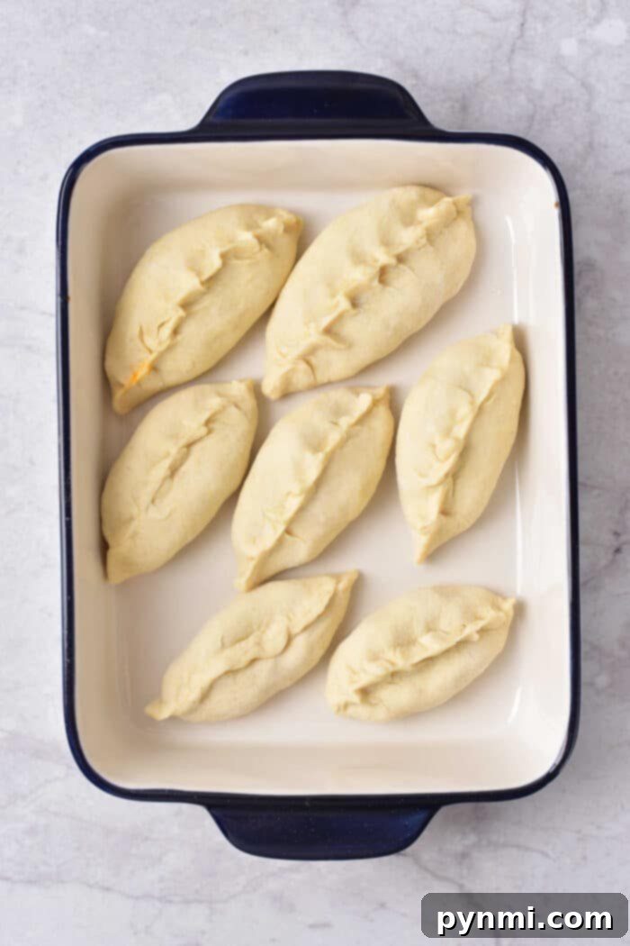 Golden Sweet Potato Dumplings 7 Step-by-step images showing the preparation of sweet potato dumplings, from dough to filled and pinched forms.