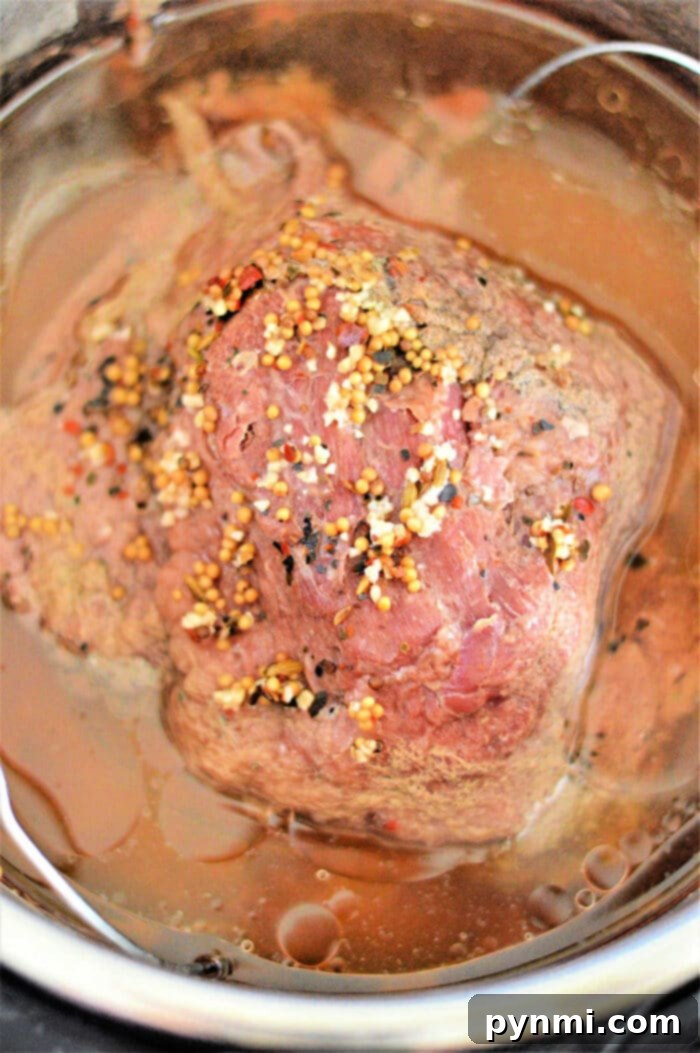 Close-up of freshly ground corned beef spices in a small bowl, ready for use.