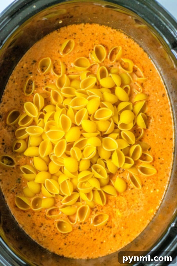 Velvety Slow Cooker Goulash 5 Rich Goulash in a Crockpot, bubbling gently