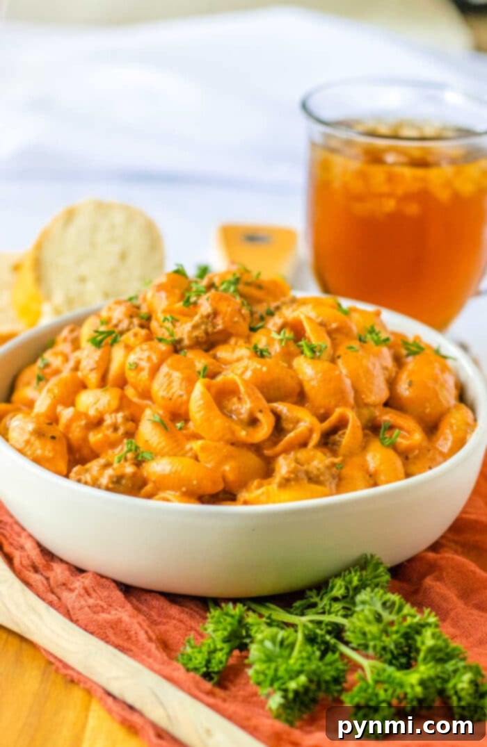 Velvety Slow Cooker Goulash 8 Old Fashioned Goulash served with fresh herbs