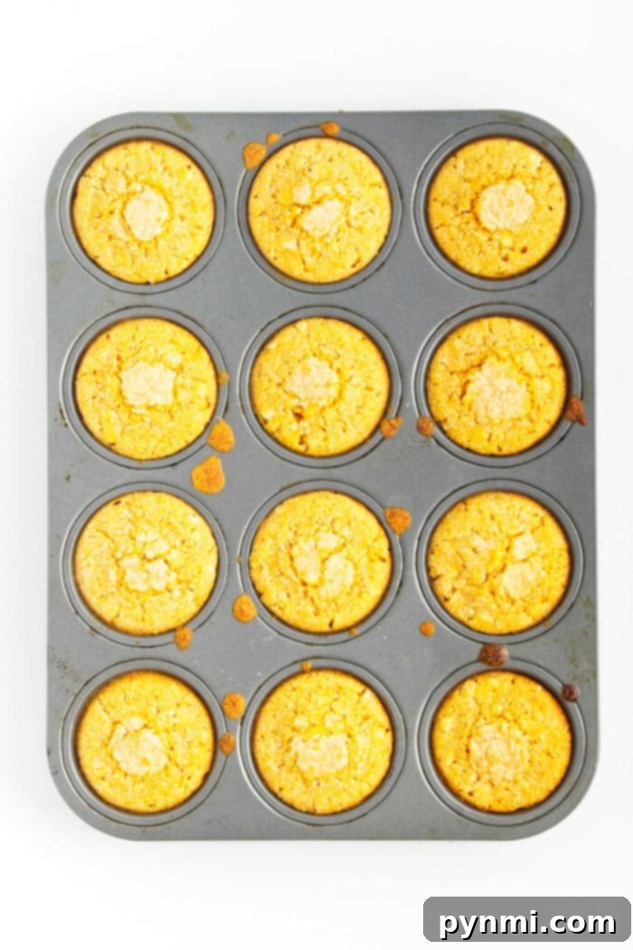 Golden Dairy-Free Cornbread 4 A plate of mini dairy-free cornbread muffins, perfect for sharing or individual servings.
