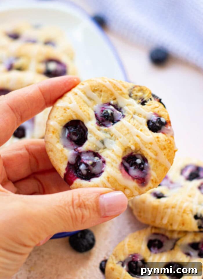 Fluffy Blueberry Biscuits 2 Blueberry Biscuits with a light glaze