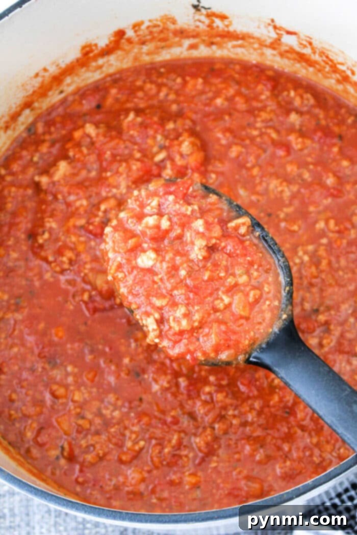 Hearty Ground Turkey Spaghetti Sauce served over pasta.