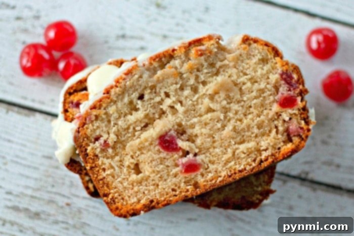 Sweet Cherry Loaf 3 Close-up of a Maraschino cherry, emphasizing its bright red color and glistening surface.