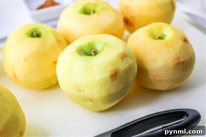 Golden Apple Gratin 3 sliced apples in oven ready for the topping