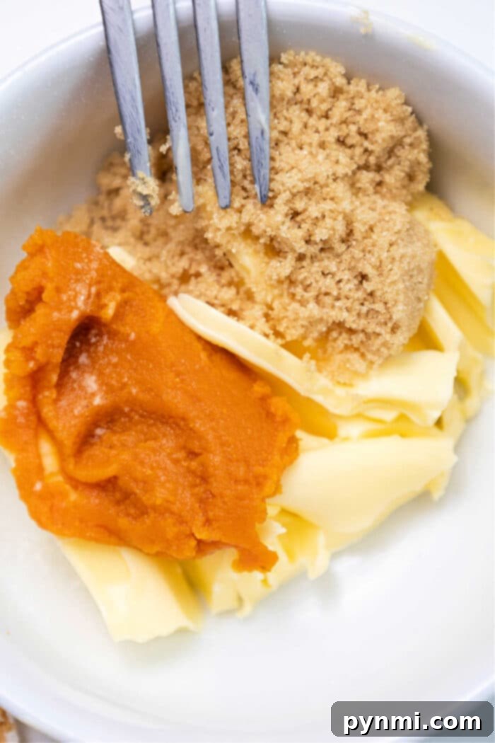 Close-up of baked pumpkin bread with yeast, showing braided texture and golden crust