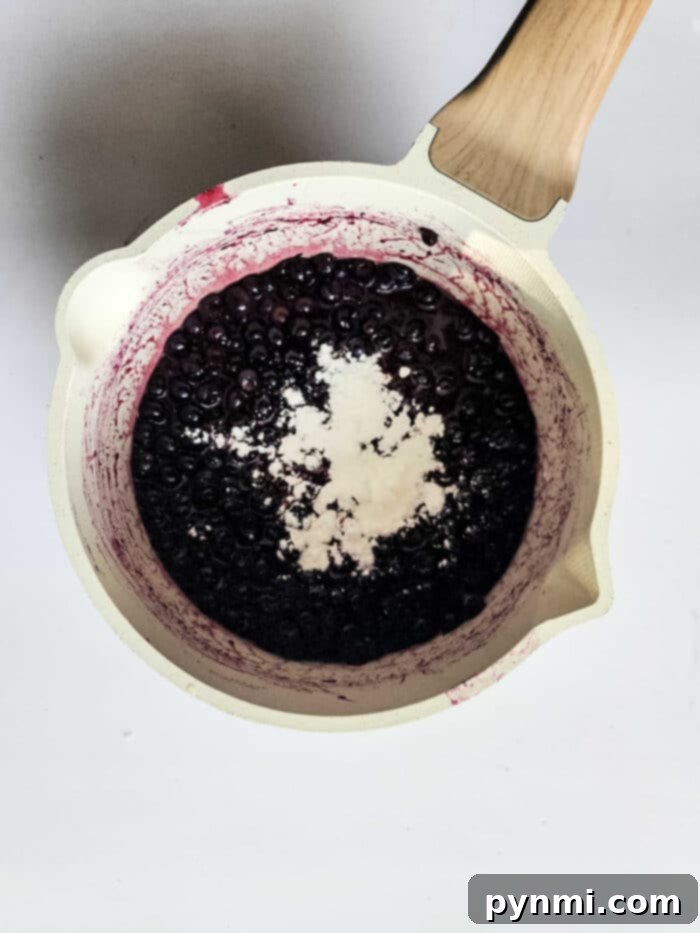Blueberry Bliss Air Fryer Bites 3 A bowl of homemade blueberry pie filling, rich in color and texture.