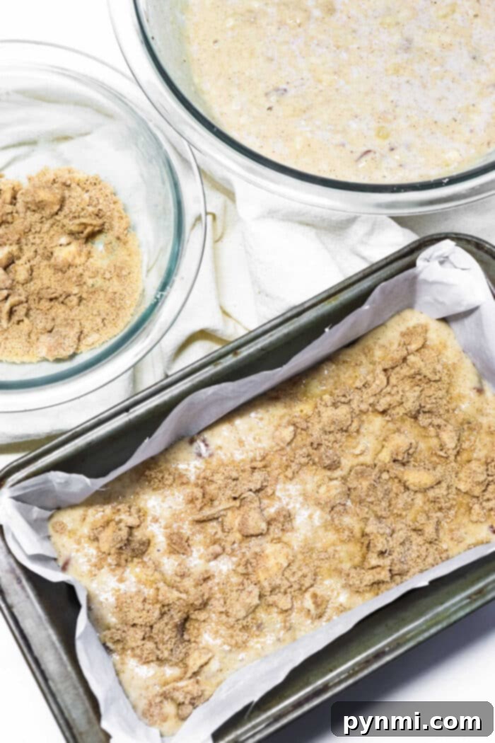 Irresistible Butter-Free Banana Bread 6 Cake Mix Banana Bread Recipe No Butter - A freshly baked, golden-brown loaf of banana bread sits on a baking rack, ready to be sliced, illustrating the ease of baking with a cake mix base and no butter.