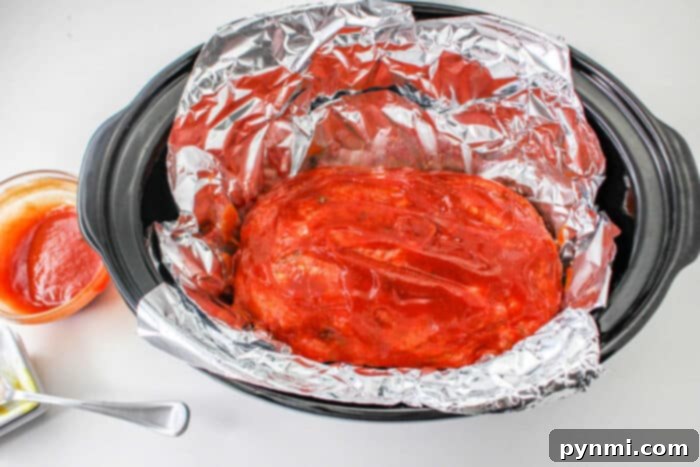 Slow Cooker Meatloaf Perfection 6 Slow Cooked Meatloaf, sliced and ready to serve