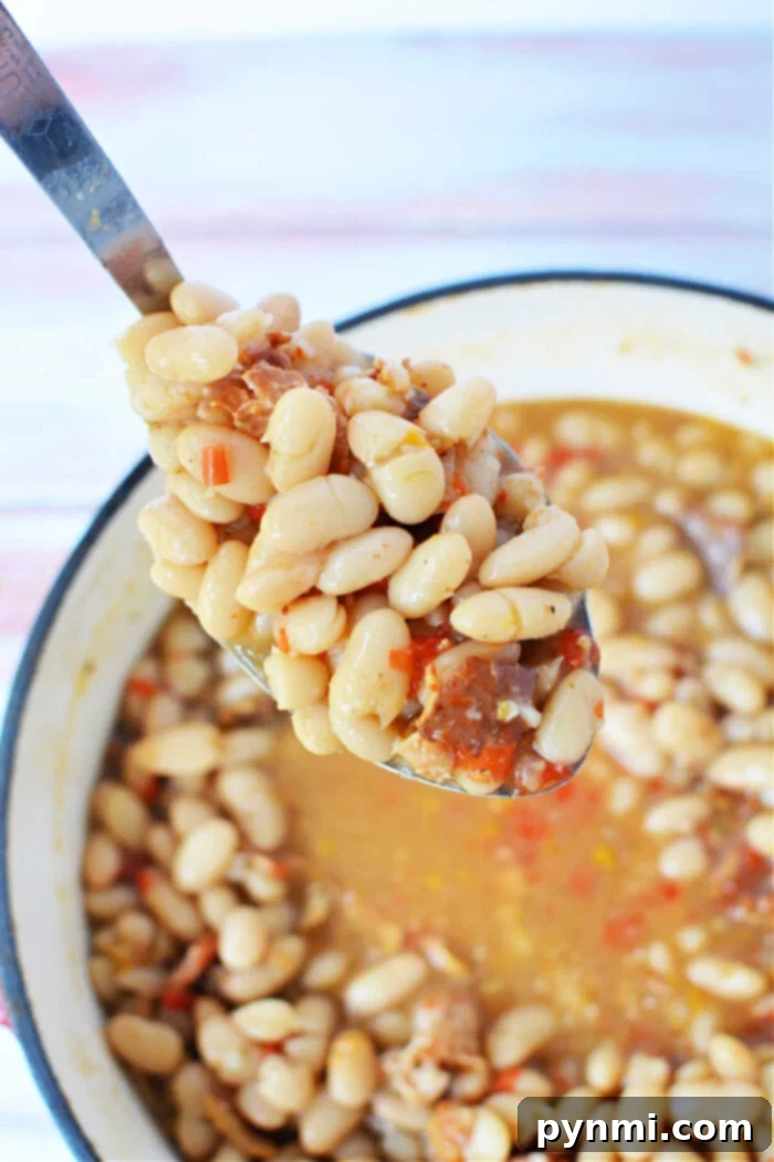 A spoonful of rich white Peruvian beans lends an authentic touch to this hearty dish.