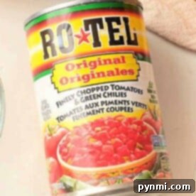 Close-up of a can of Ro-Tel Original with chopped tomatoes and green chilies, perfect for crafting your own homemade Rotel recipes.