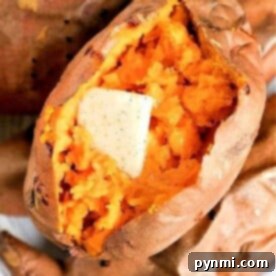 Crockpot sweet potatoes, tender and fragrant, with a pat of butter melting on top, are surrounded by more perfectly cooked sweet potatoes.