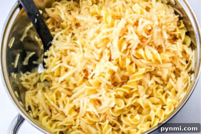 Spiced Apple Comfort Bake 4 Close-up of Golden Apple Noodle Kugel with a Deliciously Crumbly Topping