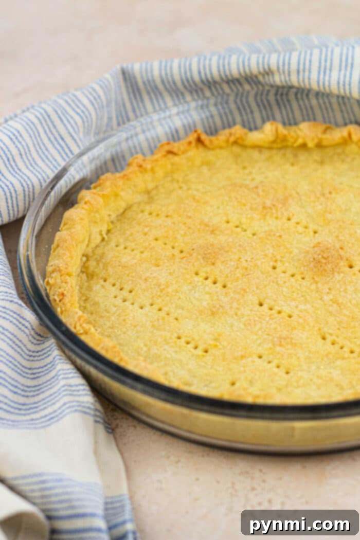 Dairy-Free Pie Crust Made Simple 7 Dairy Free Pie Crust: a finished pie with a decorative crust.
