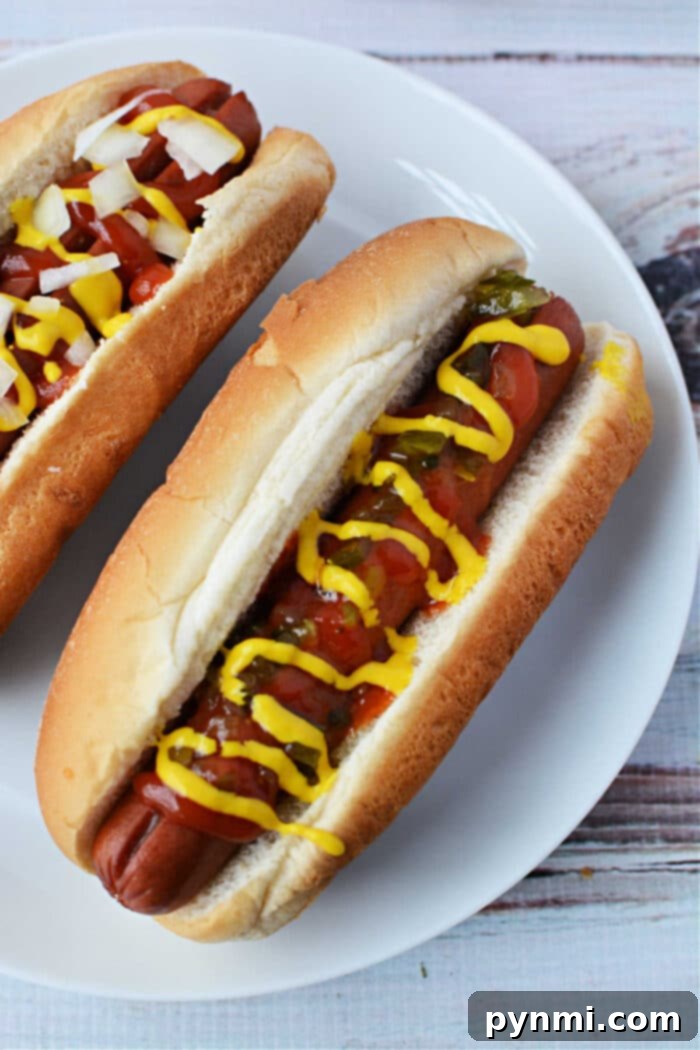 Wieners in the Oven - A close-up of beautifully cooked hot dogs, ready for toppings.