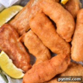 Crispy Ale-Battered Halibut 7 Golden-brown beer batter halibut pieces served in a basket with zesty lemon wedges.