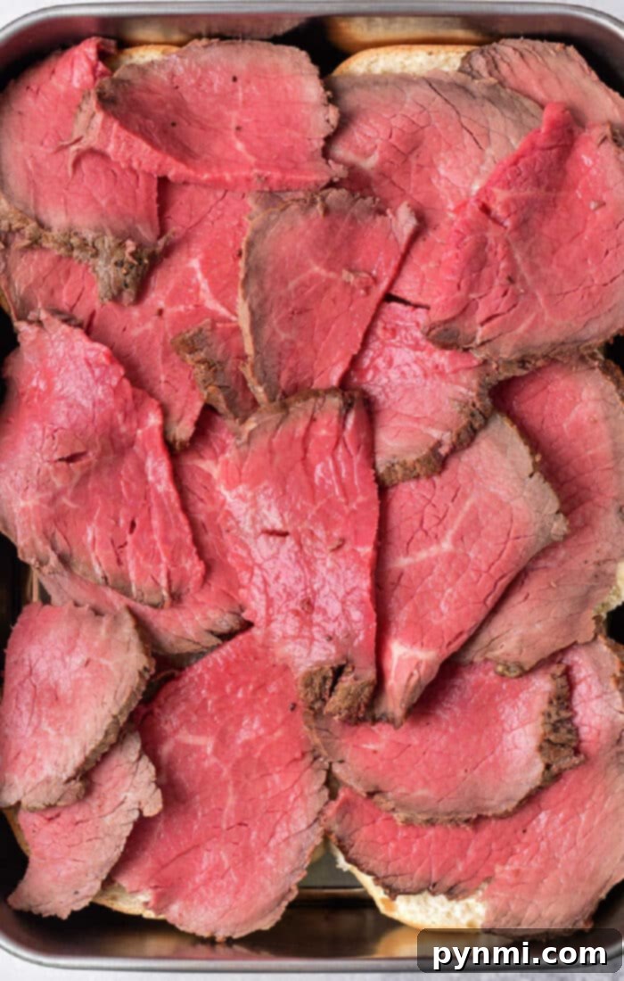 A stunning bottom round beef roast, perfectly cooked and presented.