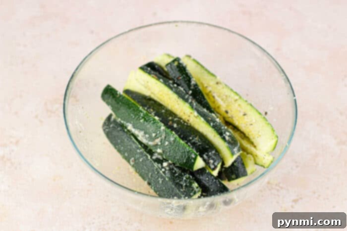 Baked zucchini with golden brown edges, ready to serve as a healthy side dish.