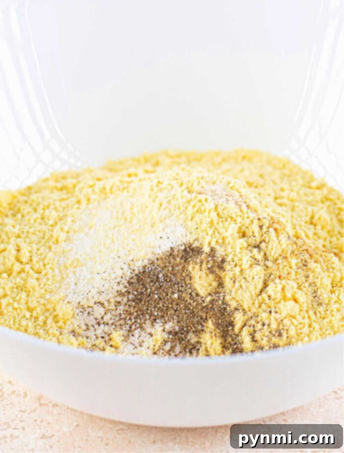 Fish Fry Seasoning - A close-up of the dry seasoning mix in a bowl