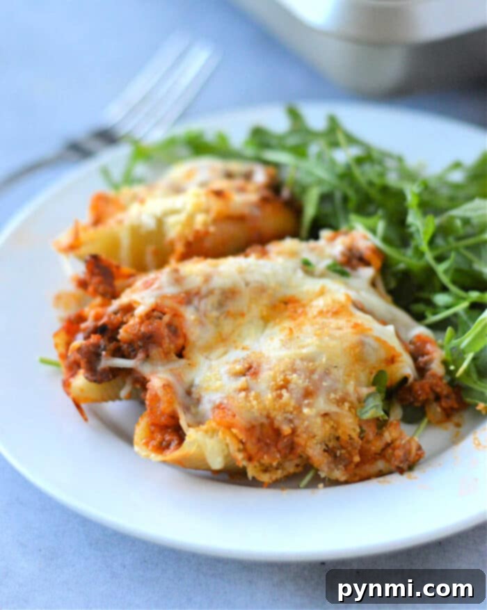 Jumbo Shells with Savory Meat and Creamy Ricotta 7 Stuffed Shells with Meat on a plate