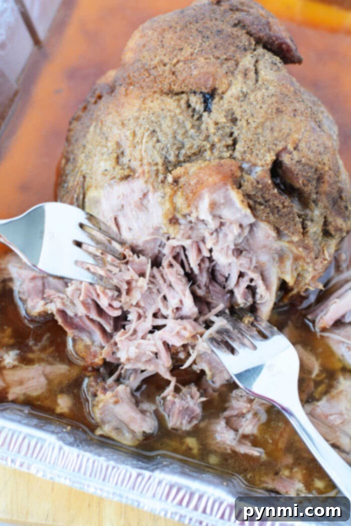 Slow Roasted Boston Butt Perfection 2 Tender Boston Butt in Oven, cooked to perfection for easy shredding.