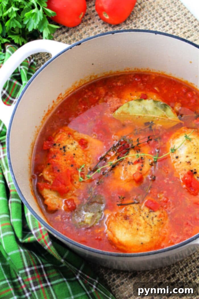 Zesty Braised Chicken Thighs 2 Deliciously braised chicken breast simmering in a rich, spicy Gochujang sauce.