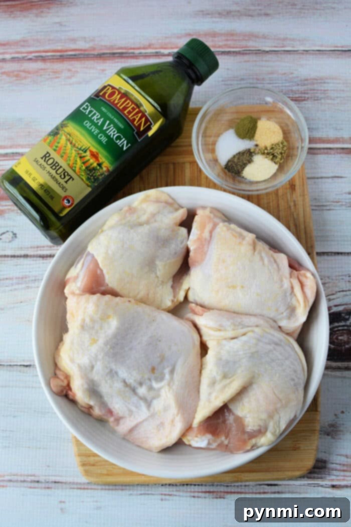 Crispy Skinned, Juicy Bone-In Chicken Thighs 4 Crispy skin chicken thighs baking in a cast iron skillet at 425 degrees oven.