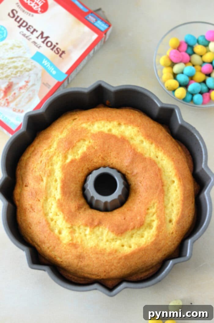 Easy Easter Cake Recipe served on a festive plate with spring decorations.