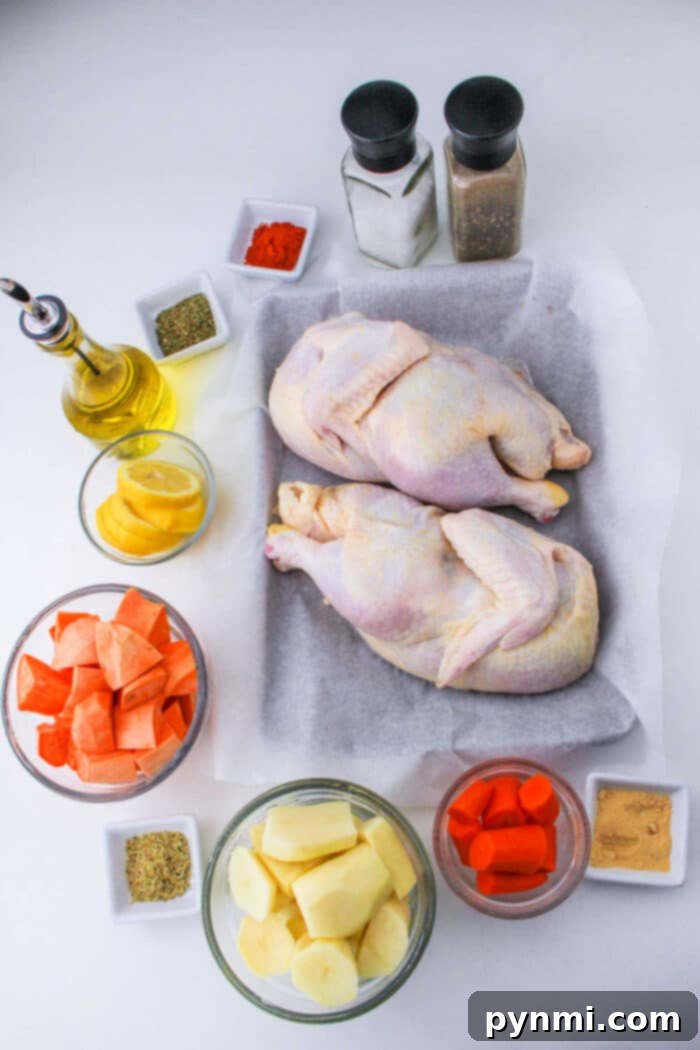 Perfect Half Chicken: Roasting Time at 400F 3 How Long to Cook Half Chicken in Oven at 400 - A beautifully roasted half chicken with crispy skin, surrounded by roasted root vegetables on a sheet pan.