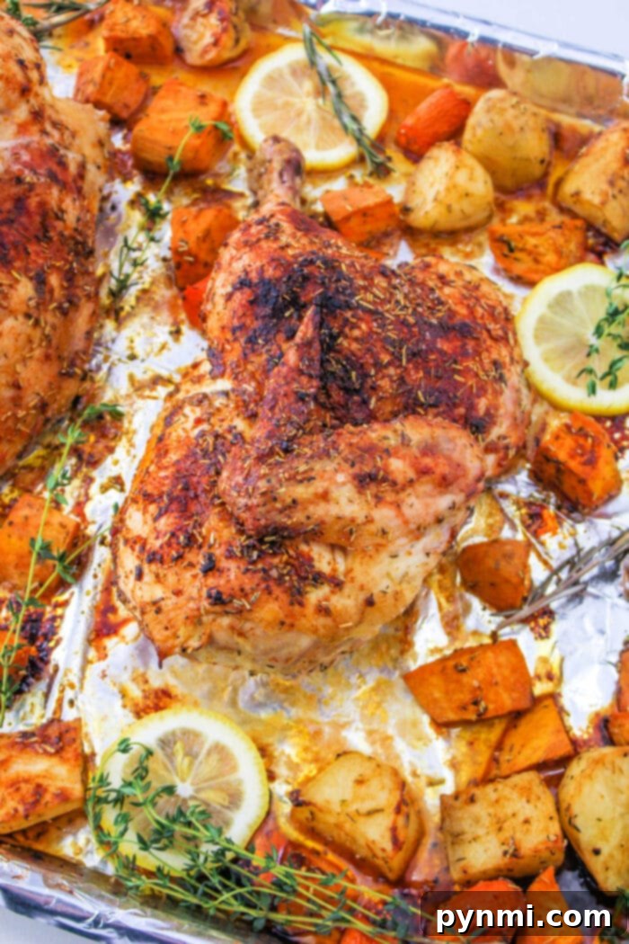 Perfect Half Chicken: Roasting Time at 400F 9 Half Chicken - A large, beautifully roasted half chicken garnished with fresh herbs and lemon slices.