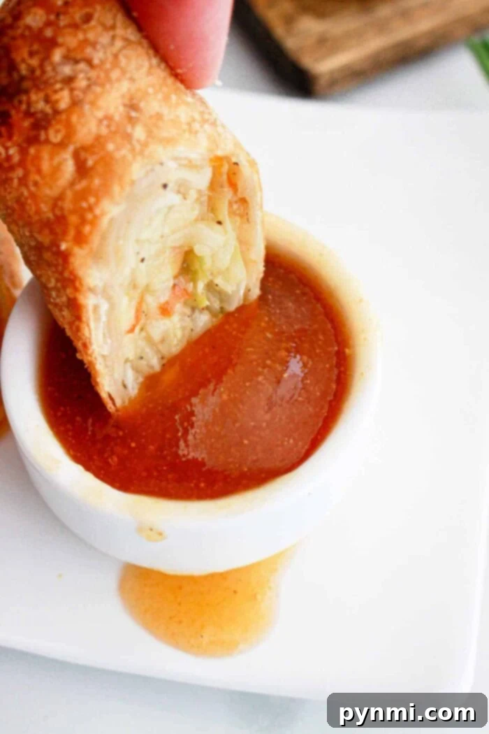Homemade Egg Roll Sauce served in two bowls, one sweet and one savory, ready for dipping.