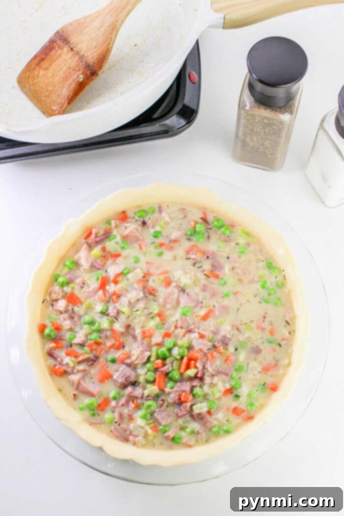 Ham Pot Pie with Pie Crust, showcasing the raw pie before baking