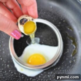 Discover how to cook quail eggs perfectly by cracking them into a cooking ring on a frying pan. With one egg already nestled inside the ring, you're set to create a delightful treat with ease and precision.