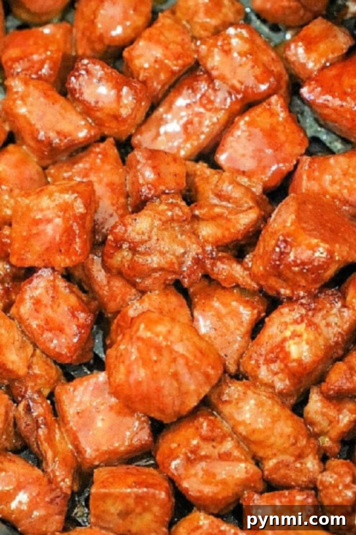Perfect Oven Steak Tips 2 Perfectly cooked steak tips in the oven, glistening with a dry rub