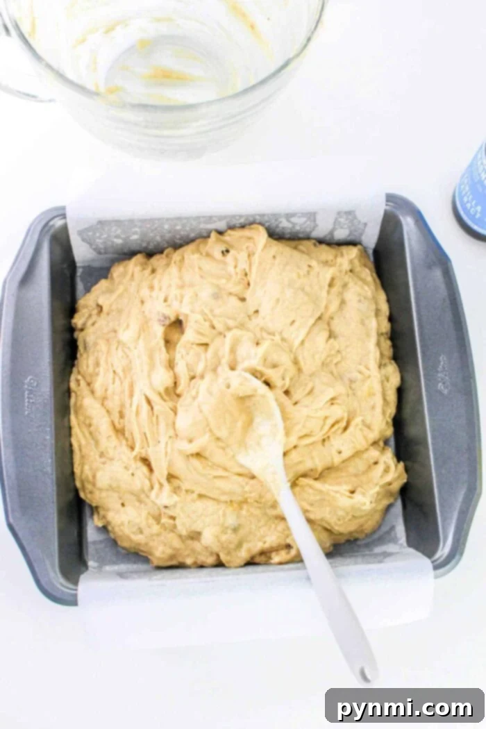 A perspective shot showcasing how to make a cake with bananas, featuring a freshly baked cake ready for frosting.