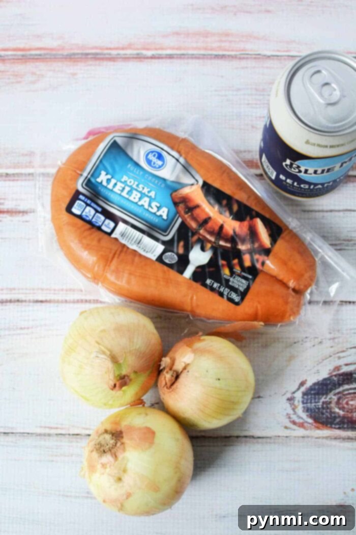 What to cook with kielbasa: a close-up of sliced kielbasa and onions simmering in a slow cooker