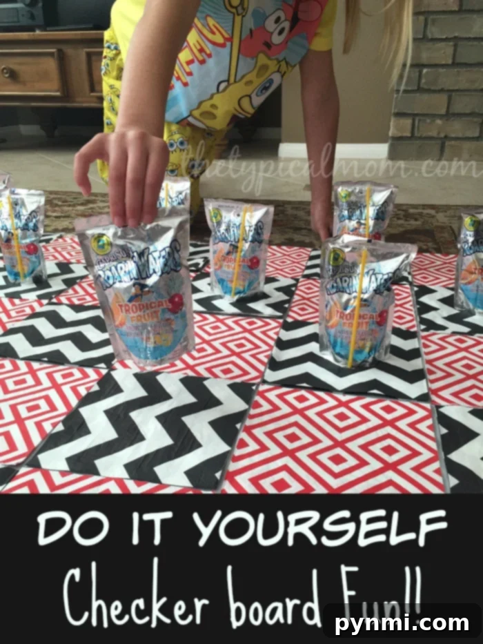DIY Giant Checkers: Fun & Cheap Games to Play at Home with Kids Using Napkins, Tablecloth, and Juice Pouches! Engaging DIY giant checkers game set up for kids at home using juice pouches and napkins
