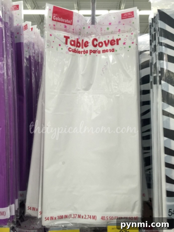 Creative & Cheap Indoor Games: Make a Giant Checker Board with Napkins, Tablecloth, & Juice Pouches for Kids! Easy and cheap indoor games for kids featuring juice pouches and a tablecloth setup