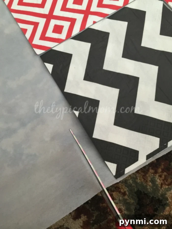 DIY Giant Checker Board Setup: Easy Steps to Create a Fun Game with Napkins and a Tablecloth! DIY giant checker board in progress, showing the napkin layout on a tablecloth
