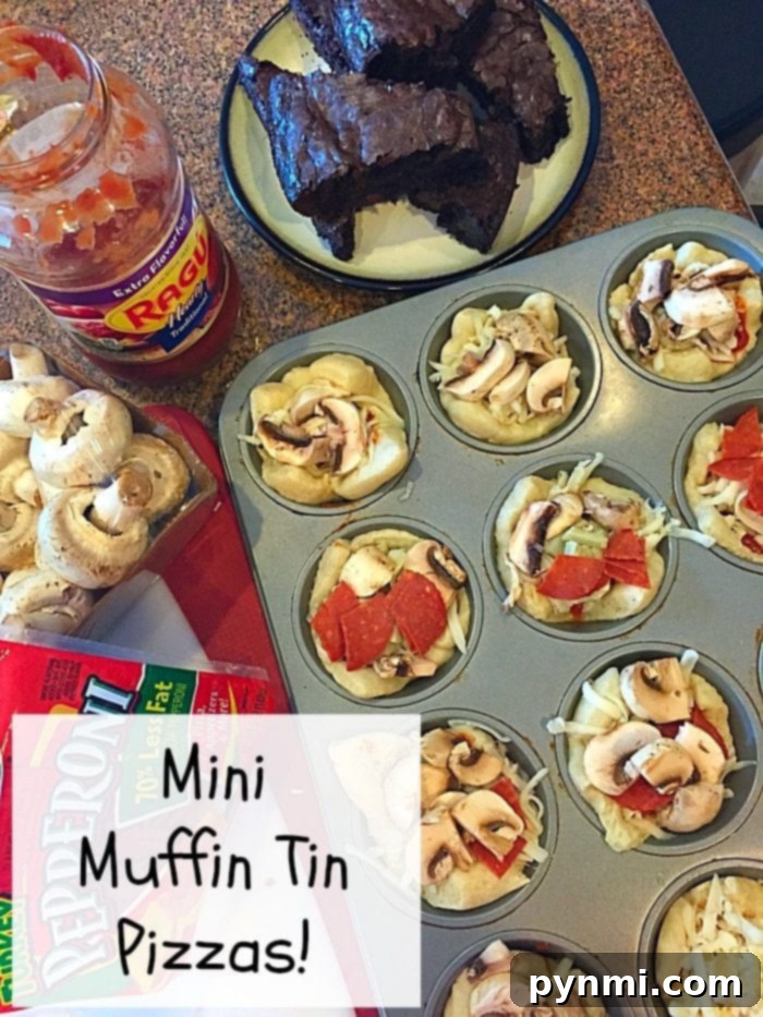 Easy Muffin Tin Pizzas: Perfect Family Dinner Idea with Refrigerated Dough and Favorite Toppings A vibrant tray of unbaked mini muffin tin pizzas, artfully arranged with fresh mushrooms and classic pepperoni, highlighting a creative and simple muffin tin dinner idea. In the background, a jar of rich pasta sauce and a box of premium pepperoni are ready for use. On a nearby plate, dark, freshly baked items hint at other delectable possibilities. The prominent label declares: Mini Muffin Tin Pizzas!