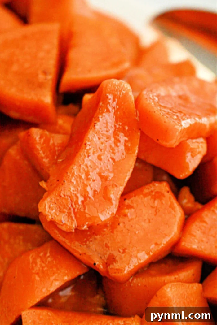 Crock-Pot Caramelized Sweet Potato Delight 2 Slow Cooker Candied Sweet Potatoes with a glossy, caramelized finish, ready to serve.