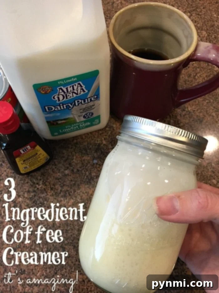 Homemade vanilla coffee creamer in a mason jar, ready to pour into coffee