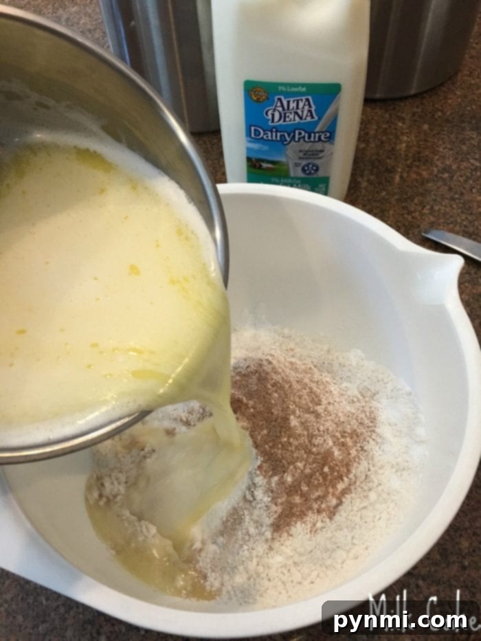 Here is an easy recipe for hot milk cake that is amazing and only needs a few ingredients. It's delicious as is and a great base for strawberry shortcake too! If you've never heard of milk cake it is a light cake that melts in your mouth and is simple to throw together for a simple dessert. #milk #cake Hot milk cake sliced and ready to be enjoyed.