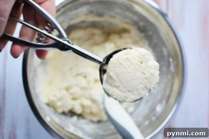 Preparing the sour cream biscuit dough.