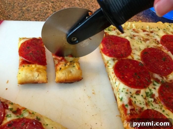 Homemade Family Movie Magic 4 A spread of delicious and inexpensive family movie night ideas with pizza and snacks.