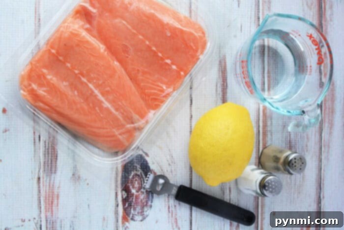 Tender Pressure Cooker Salmon in Minutes 3 A delicious salmon recipe begins with raw fillets, a fresh lemon, and a measuring cup of water. Add salt and pepper for zest. Use a pressure cooker to infuse flavors effortlessly. Dont forget the black bottle opener nearby for your favorite refreshment.