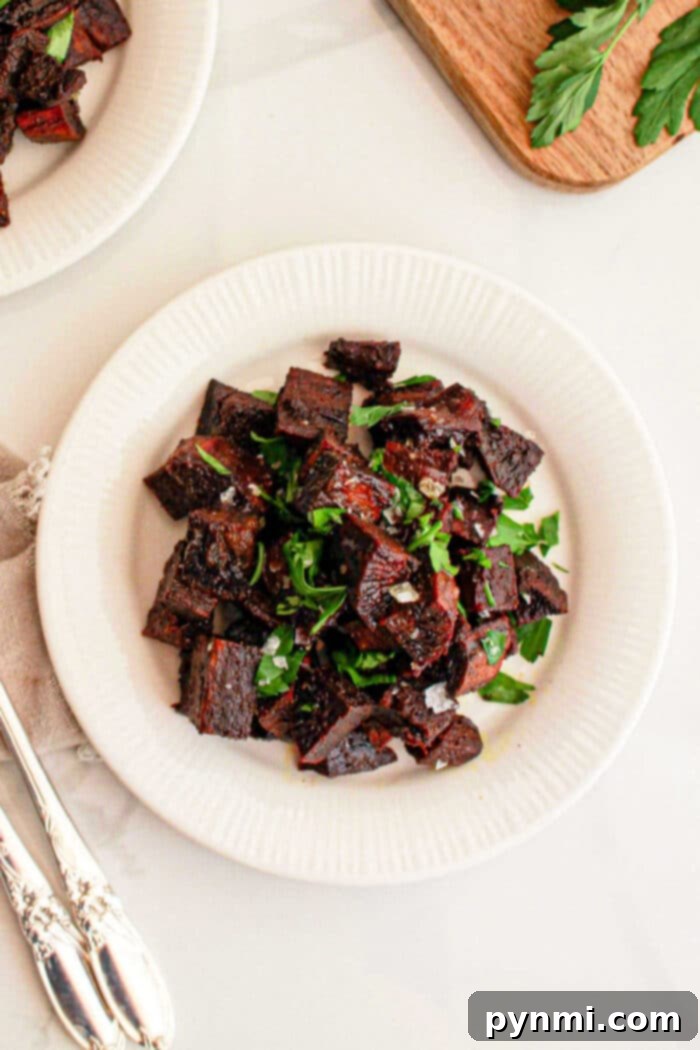 A white plate filled with crispy purple sweet potato, ideal for those seeking an exciting new recipe twist.