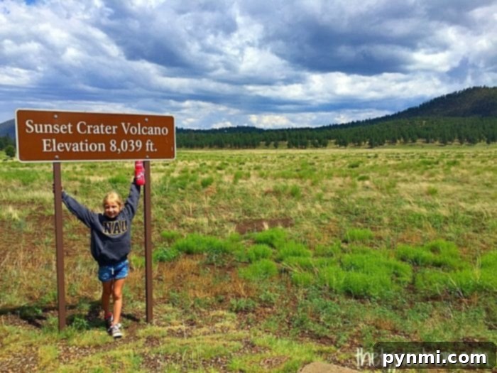 Discover Sunset Crater Volcano National Monument: explore ancient lava fields and volcanic cones near Flagstaff, a short drive from Sedona. Sunset Crater Volcano National Monument near Flagstaff, Arizona, showcasing volcanic cinder cones and hardened lava fields under a blue sky