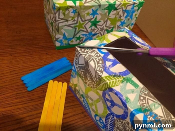 Give Kleenex Boxes a Second Life 6 Beginning steps of repurposing a Kleenex box into a multi-compartment school supply organizer.